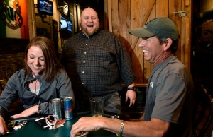 Scott Sommerdorf   |  The Salt Lake Tribune Piper Down Co-Poker Director Les Pendergraft interacts with players during a tournament at Piper Down, Tuesday, April 21, 2015.